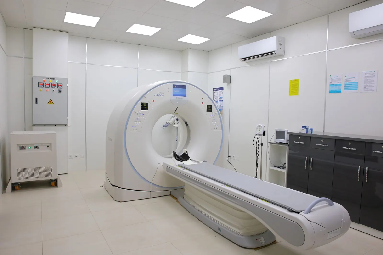 Modern CT scanner in a bright, clean diagnostic imaging room